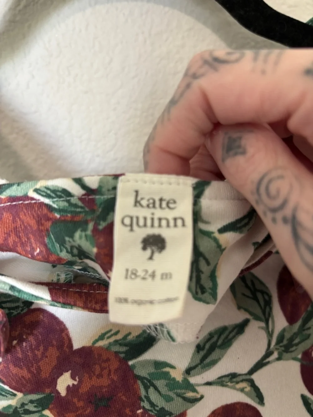 Kate Quinn Kids White One-Piece Romper with Red Fruit Print